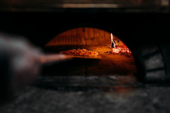 pizza-al-forno-a-legna_109710-4553